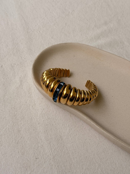 Bracelet YSL vintage - Manchette dorée et strass bleus