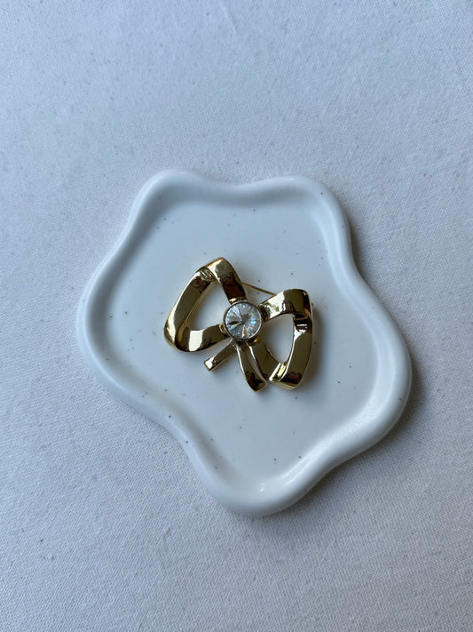 Broche Valentino vintage - Noeud doré et strass central