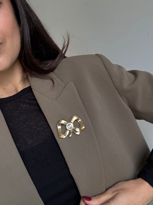 Broche Valentino vintage - Noeud doré et strass central