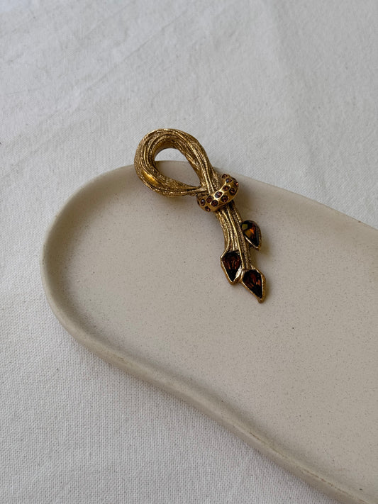 Broche vintage - Noeud en résine et cabochons ambrés