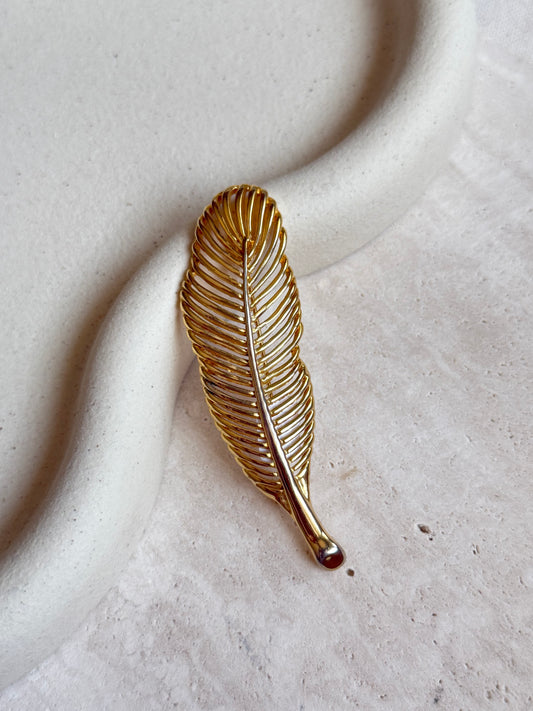 Broche plume dorée vintage