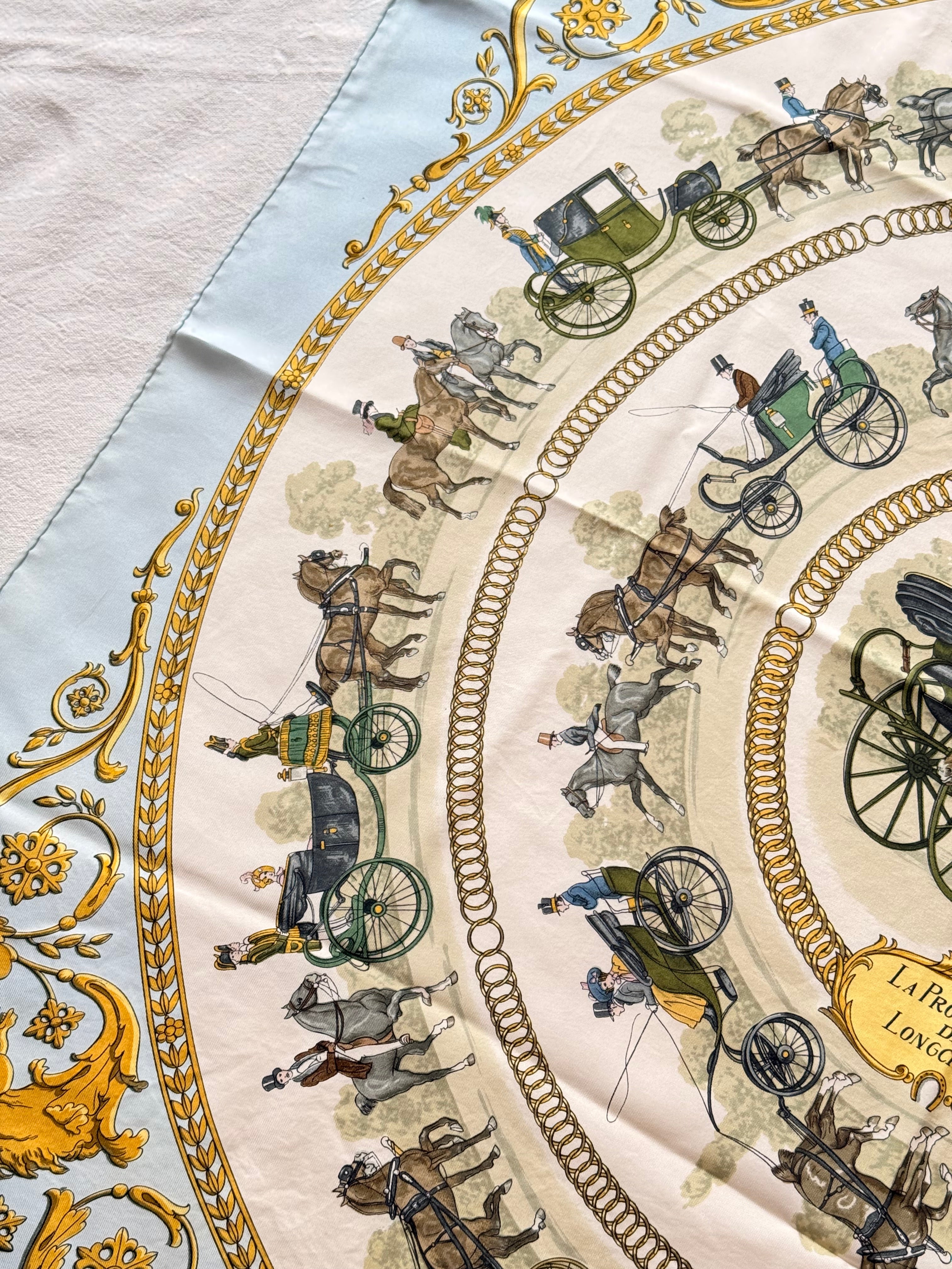 Foulard Hermès – Modèle La Promenade de Longchamps bleu ciel