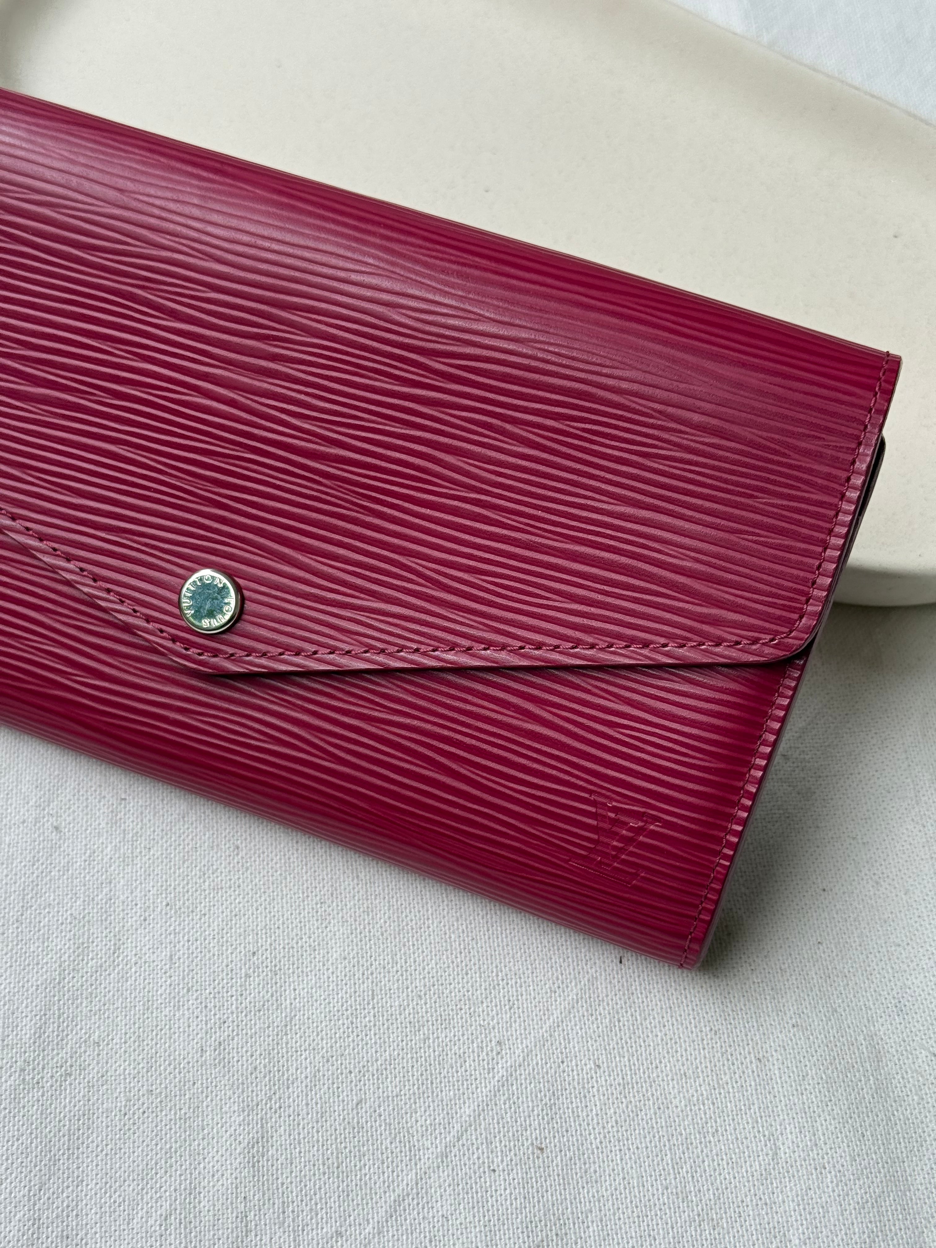 Portefeuille Louis Vuitton - Modèle Sarah cuir épi framboise