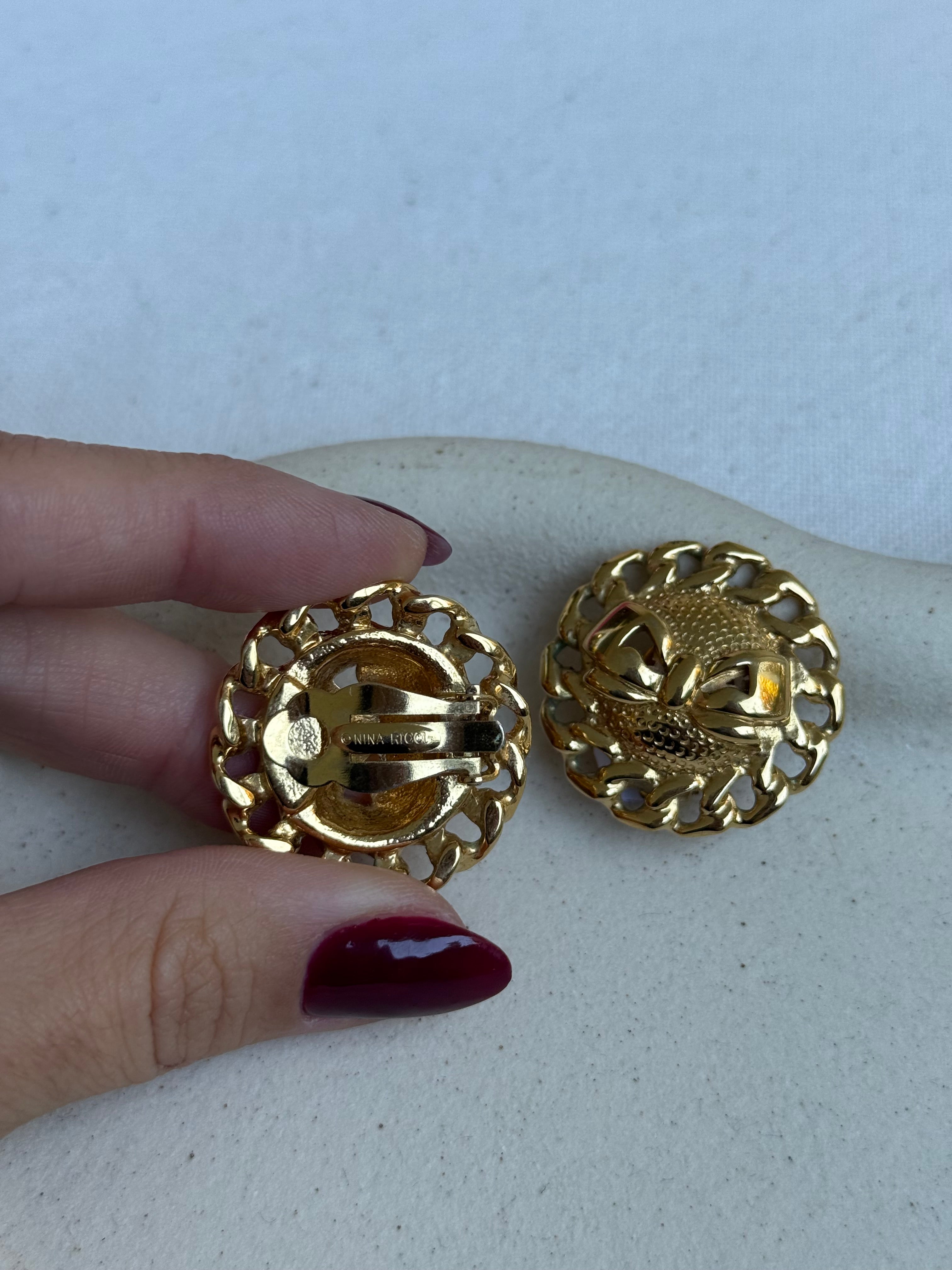 Boucles d’oreilles Nina Ricci vintage - Dorées avec noeud central