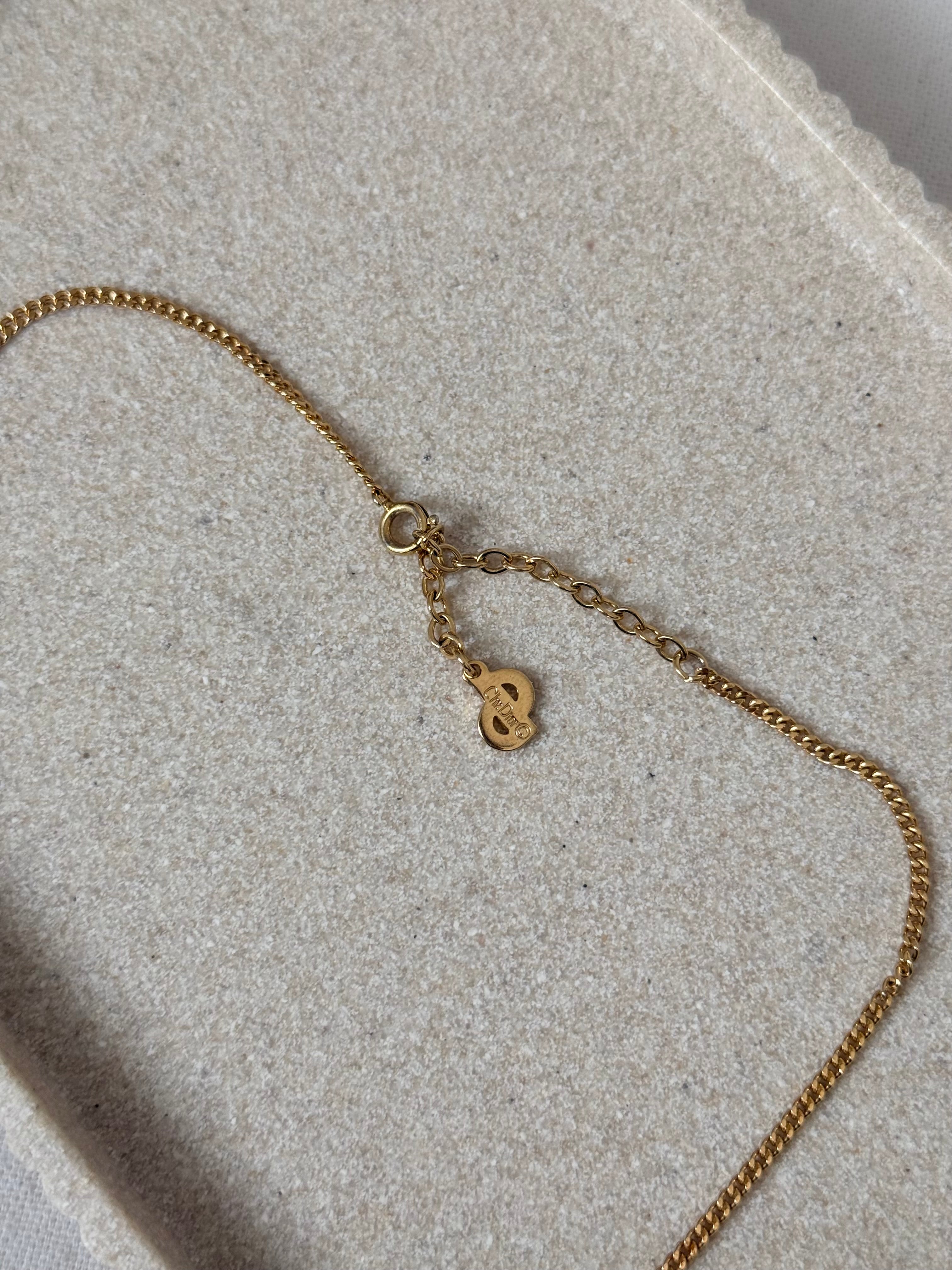 Collier Christian Dior vintage - Pendentif CD doré et strass