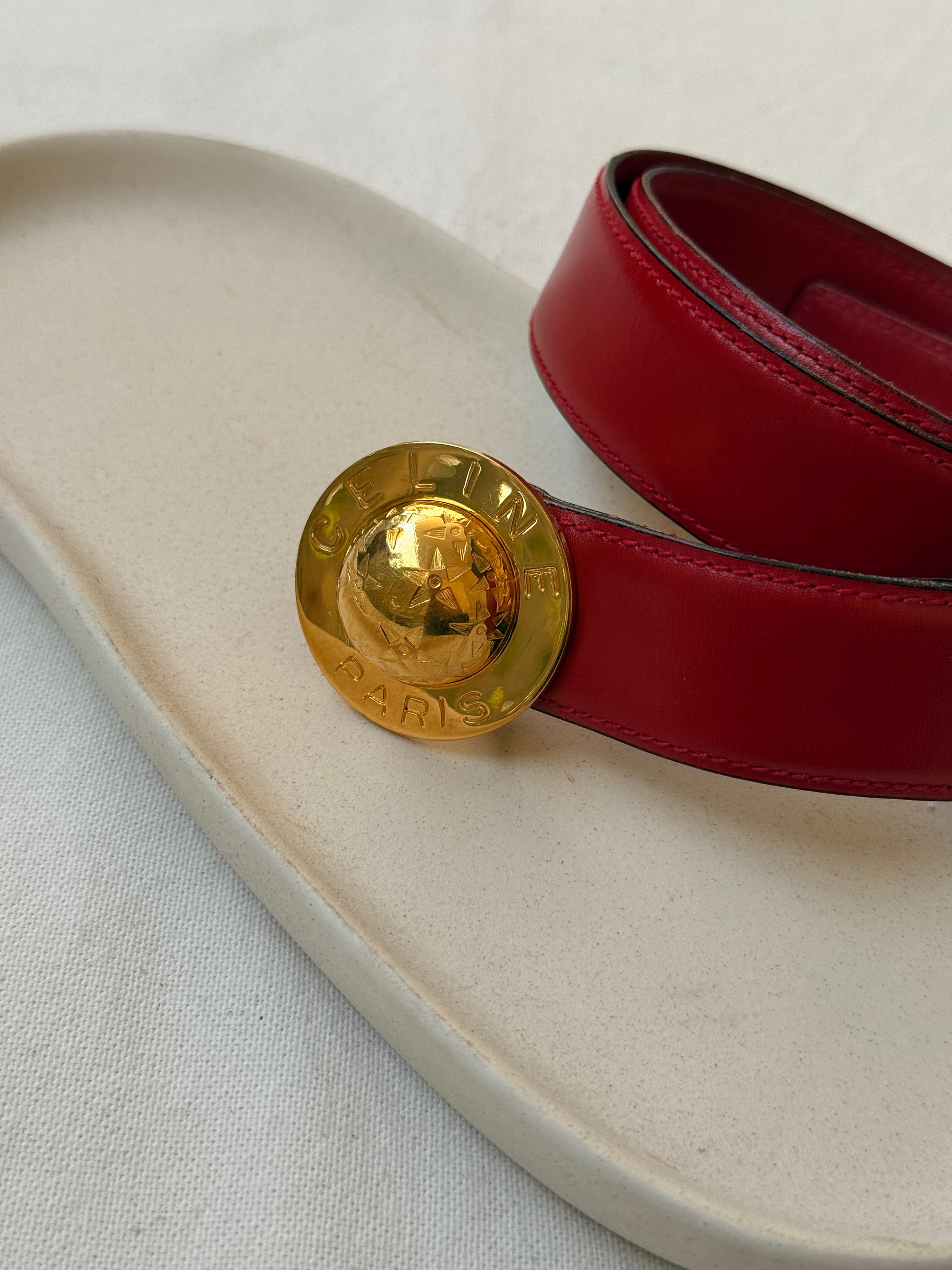 Ceinture Céline vintage - Boucle planète dorée et cuir rouge