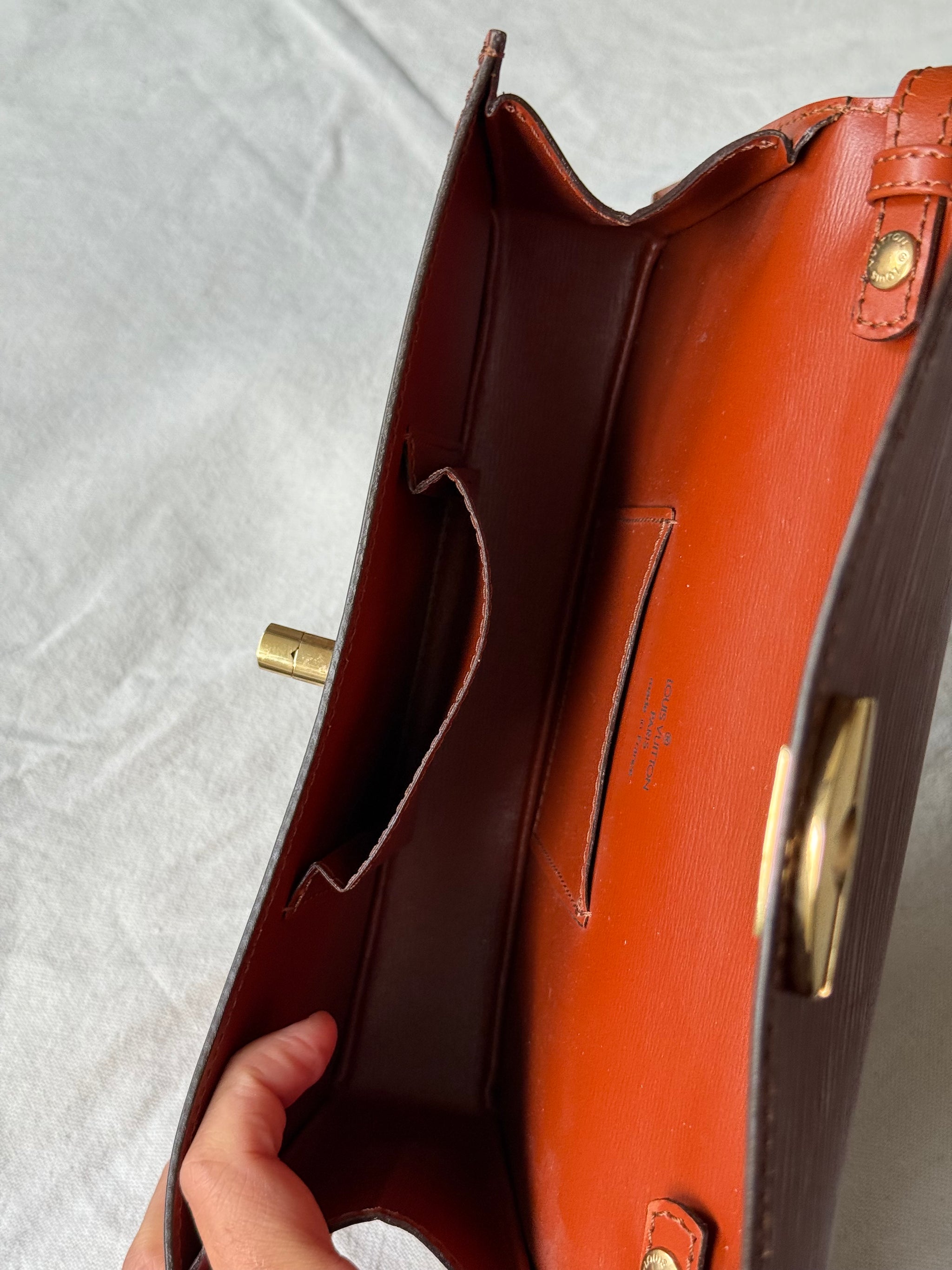 Sac Louis Vuitton- Modèle Presbourg en cuir épi cognac