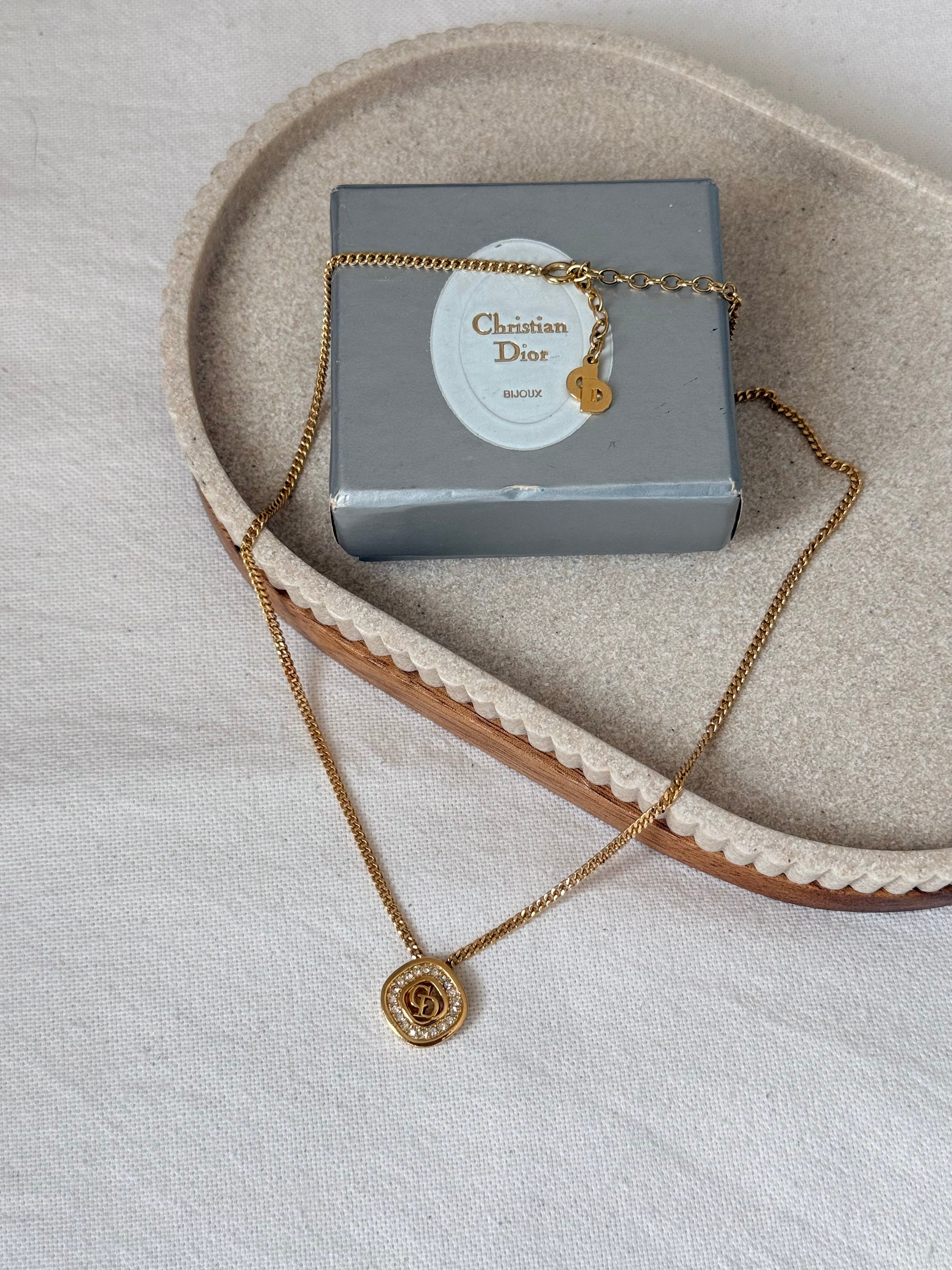 Collier Christian Dior vintage - Pendentif CD doré et strass