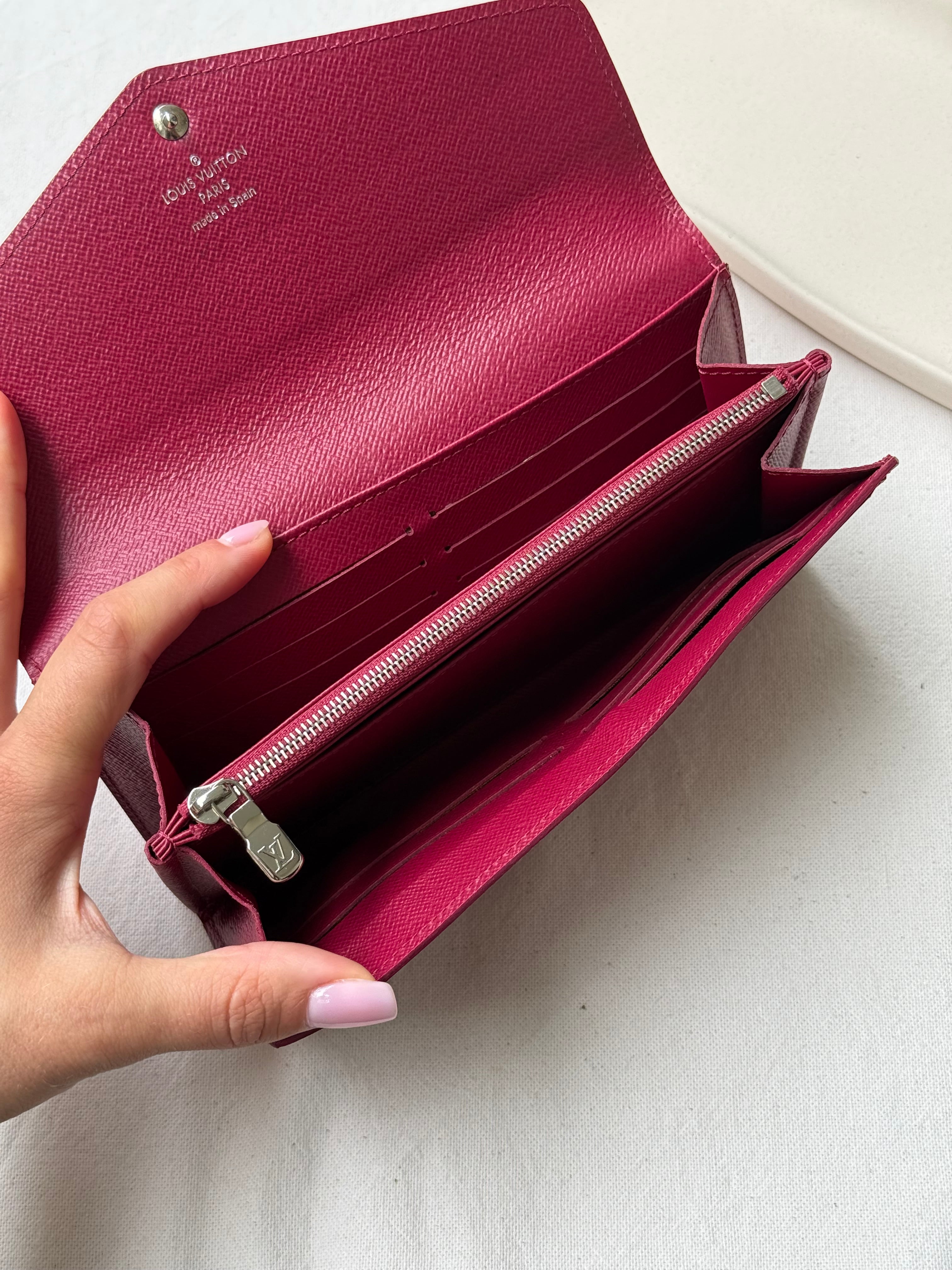 Portefeuille Louis Vuitton - Modèle Sarah cuir épi framboise