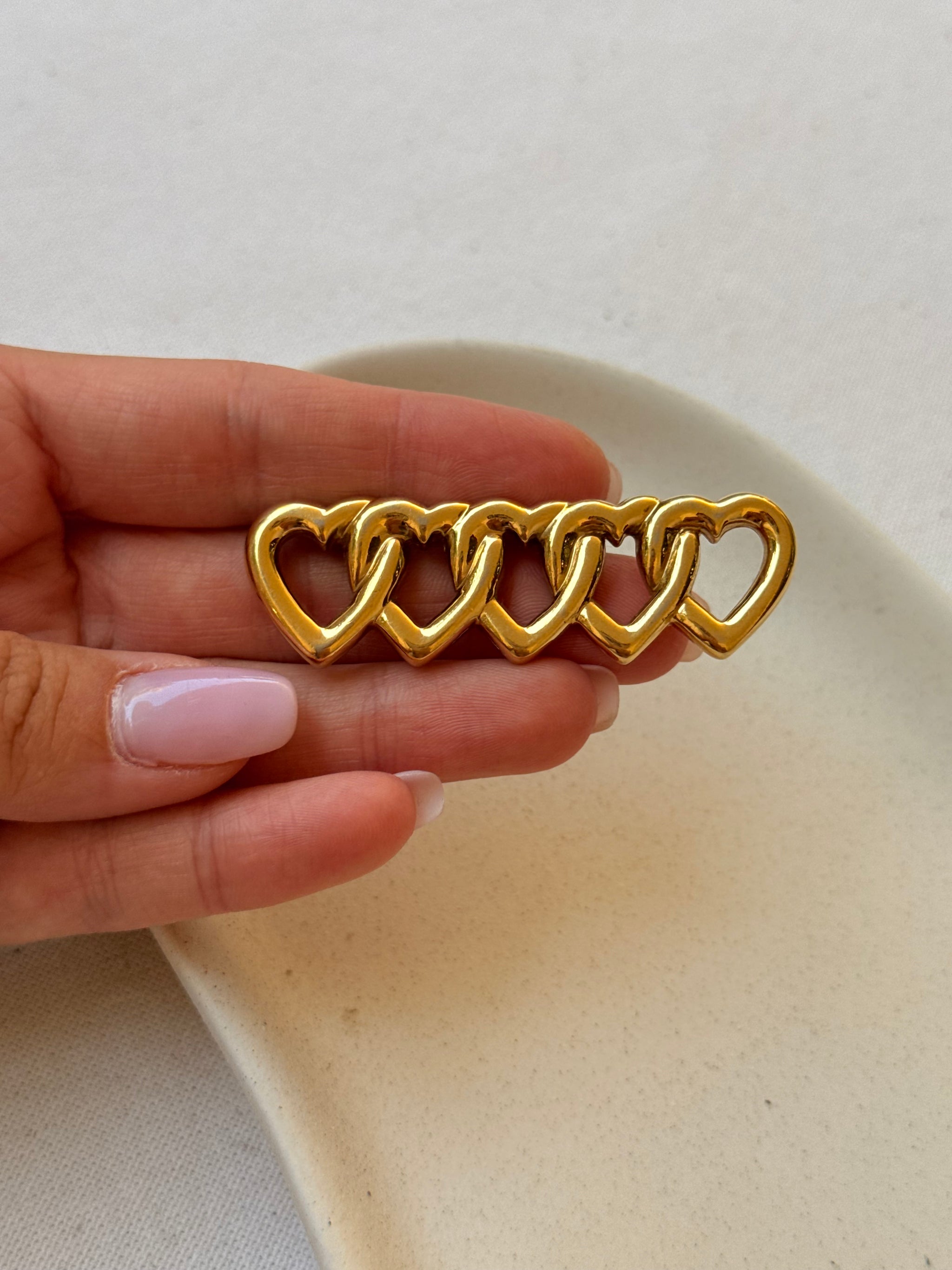 Broche Agatha vintage - Cœurs entrelacés dorés