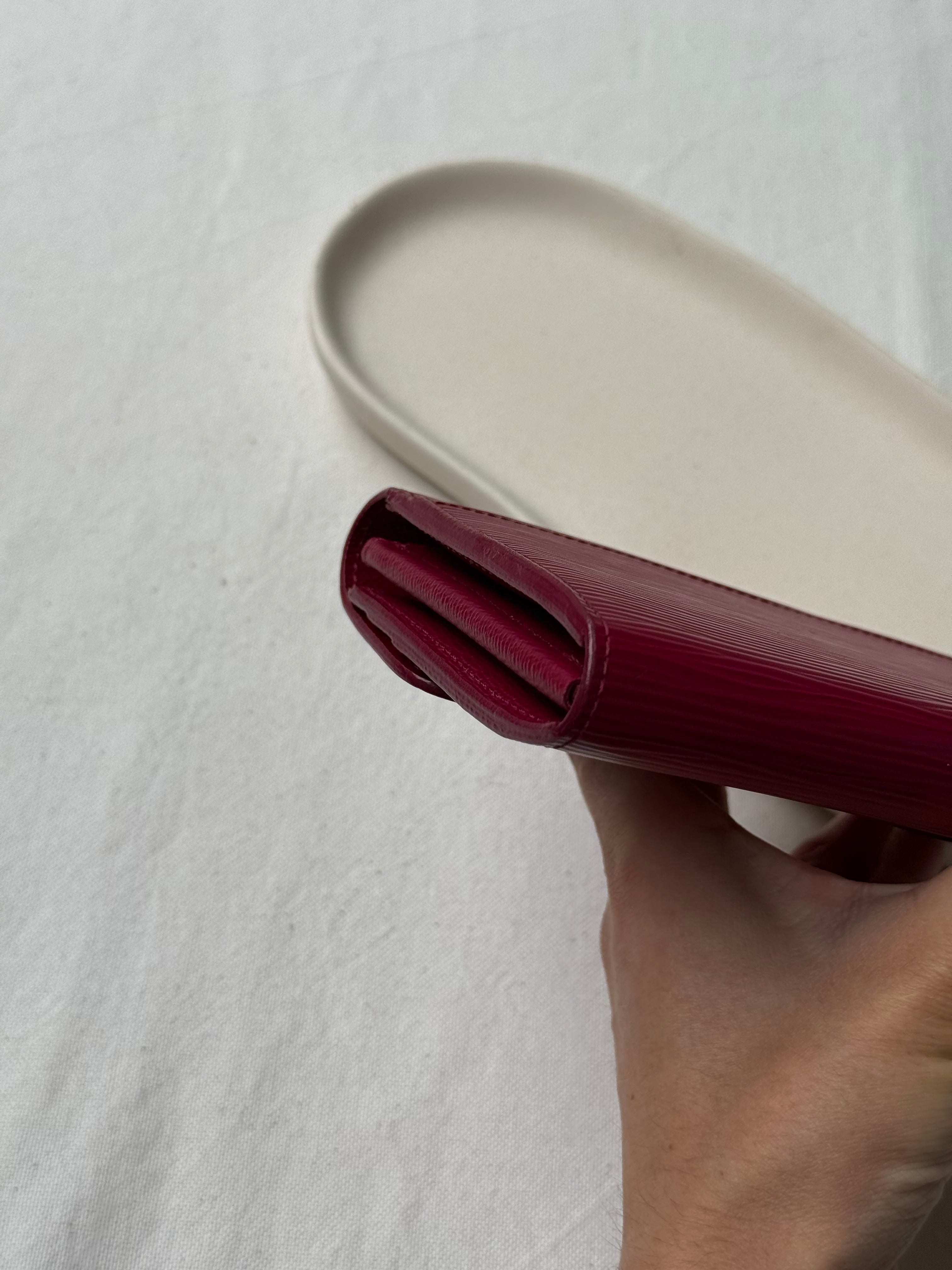 Portefeuille Louis Vuitton - Modèle Sarah cuir épi framboise