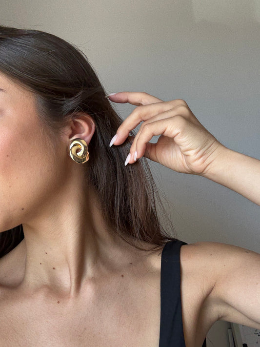 Boucles d’oreilles Christian Dior vintage - Anneaux dorés entremêlés