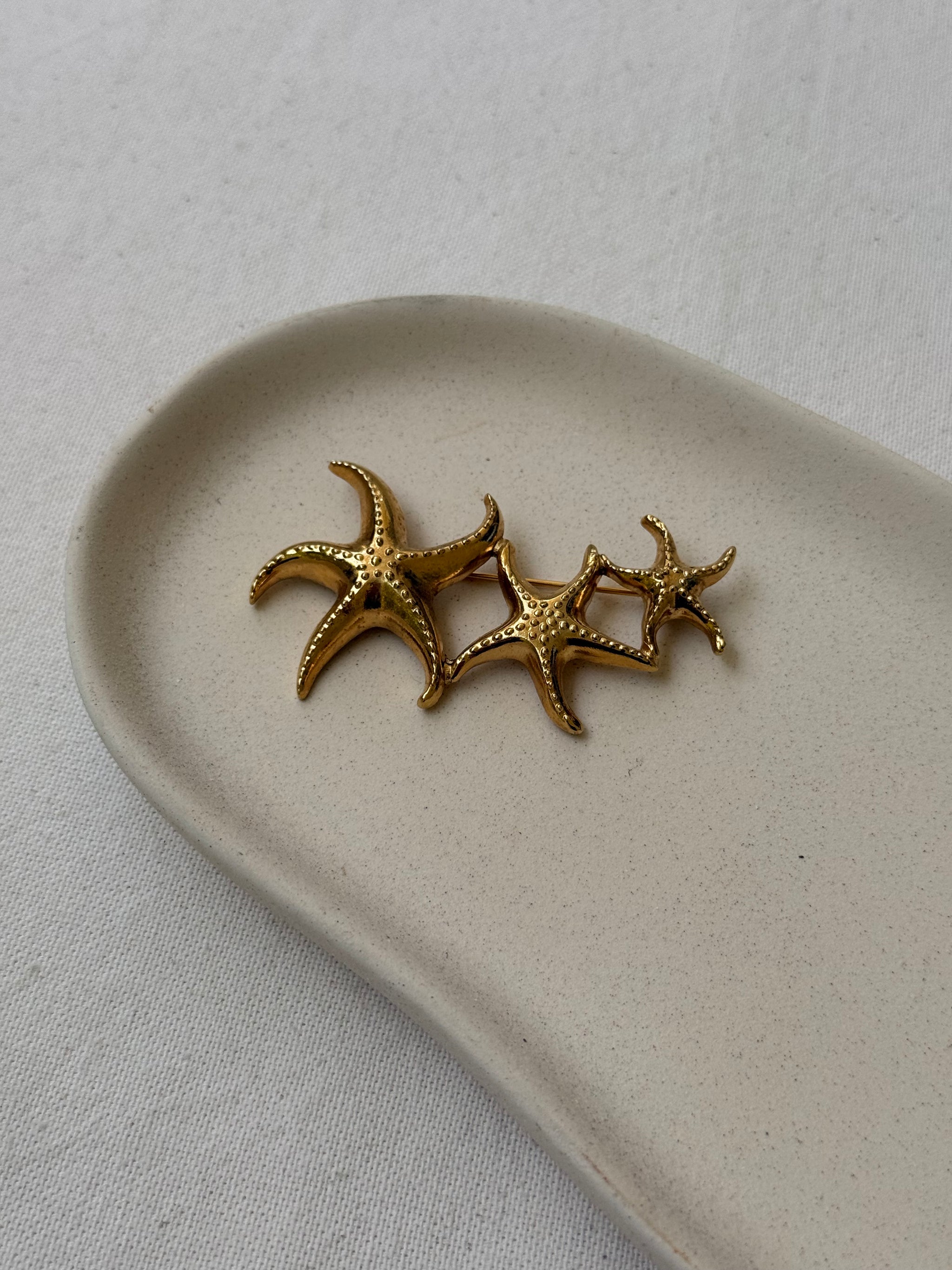 Broche vintage - Étoiles de mer dorée