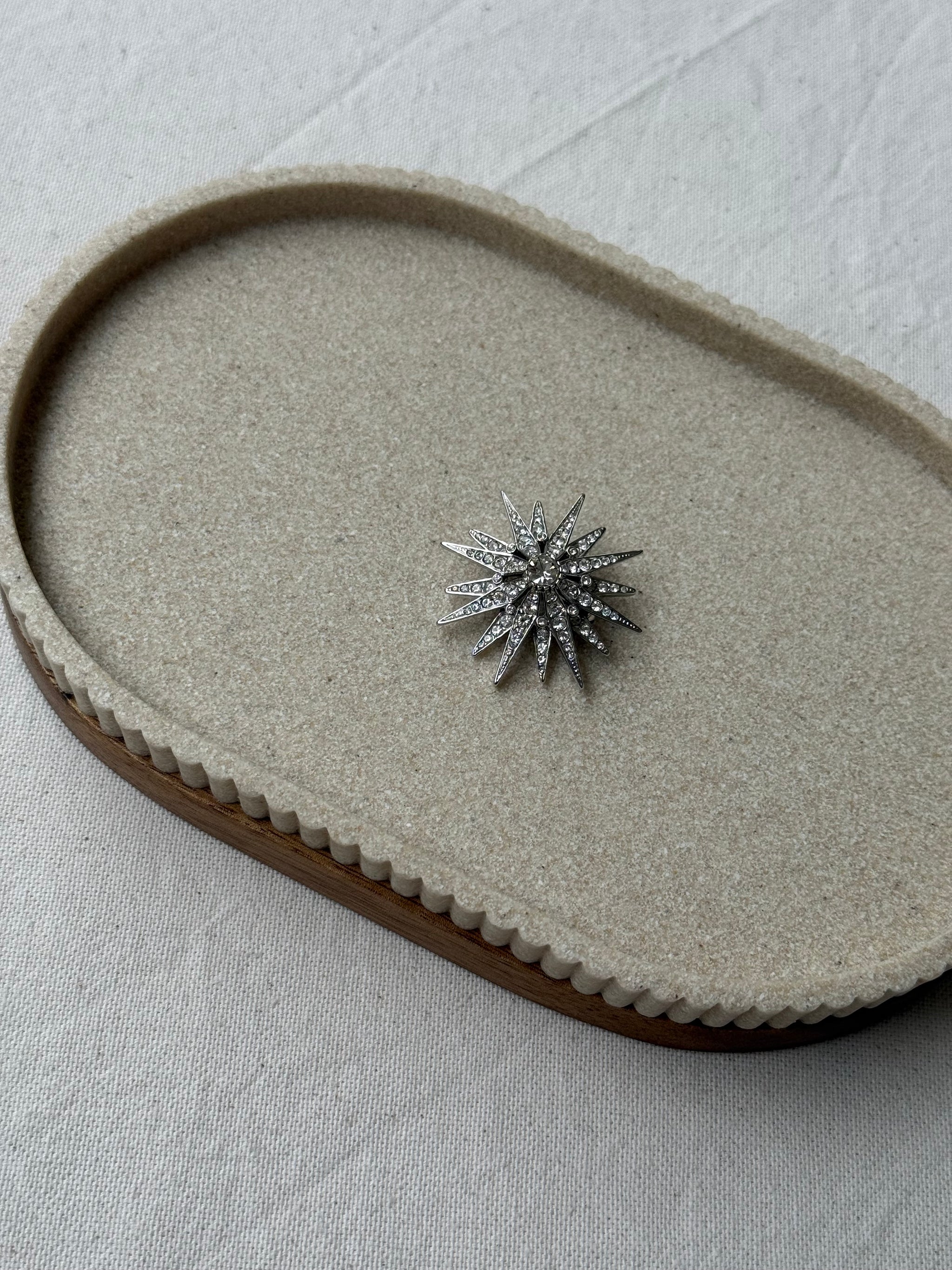 Broche Attwood & Sawyer vintage - Étoile scintillante argentée