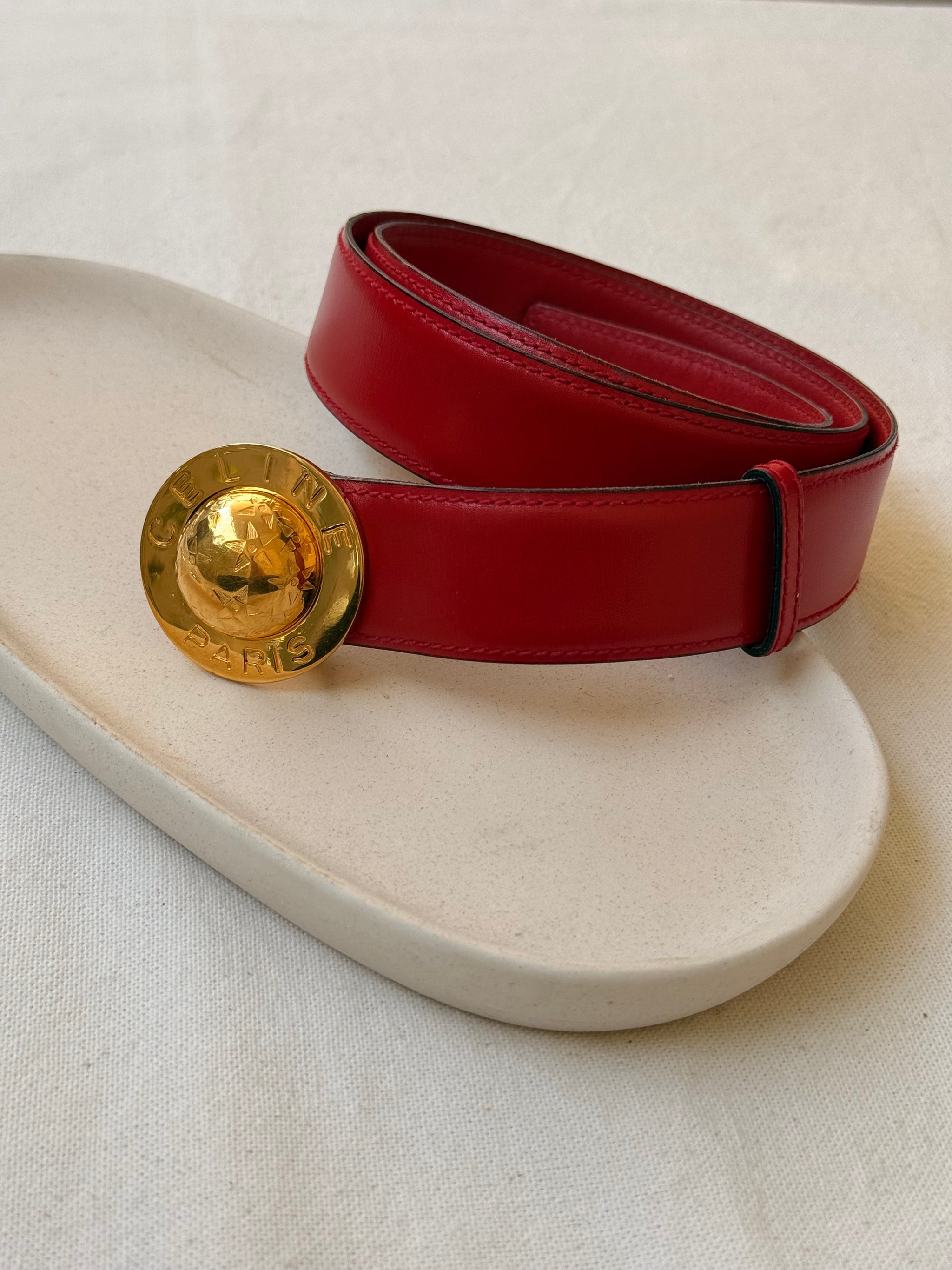 Ceinture Céline vintage - Boucle planète dorée et cuir rouge