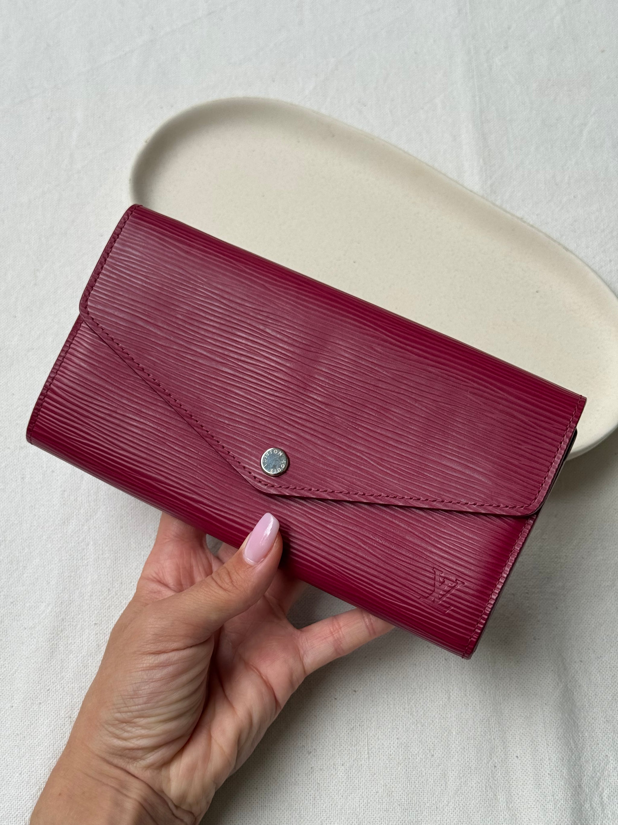 Portefeuille Louis Vuitton - Modèle Sarah cuir épi framboise