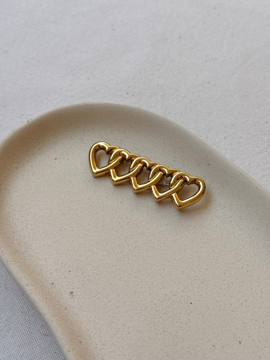 Broche Agatha vintage - Cœurs entrelacés dorés