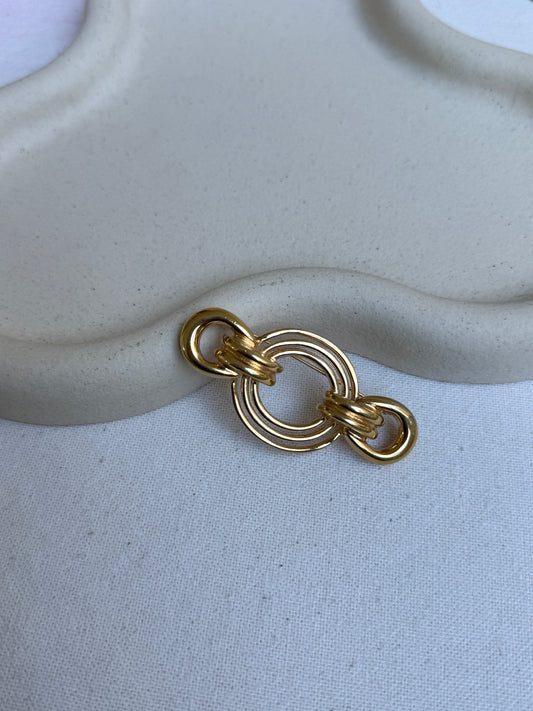 Broche Trifari vintage - Anneaux entrelacés dorés