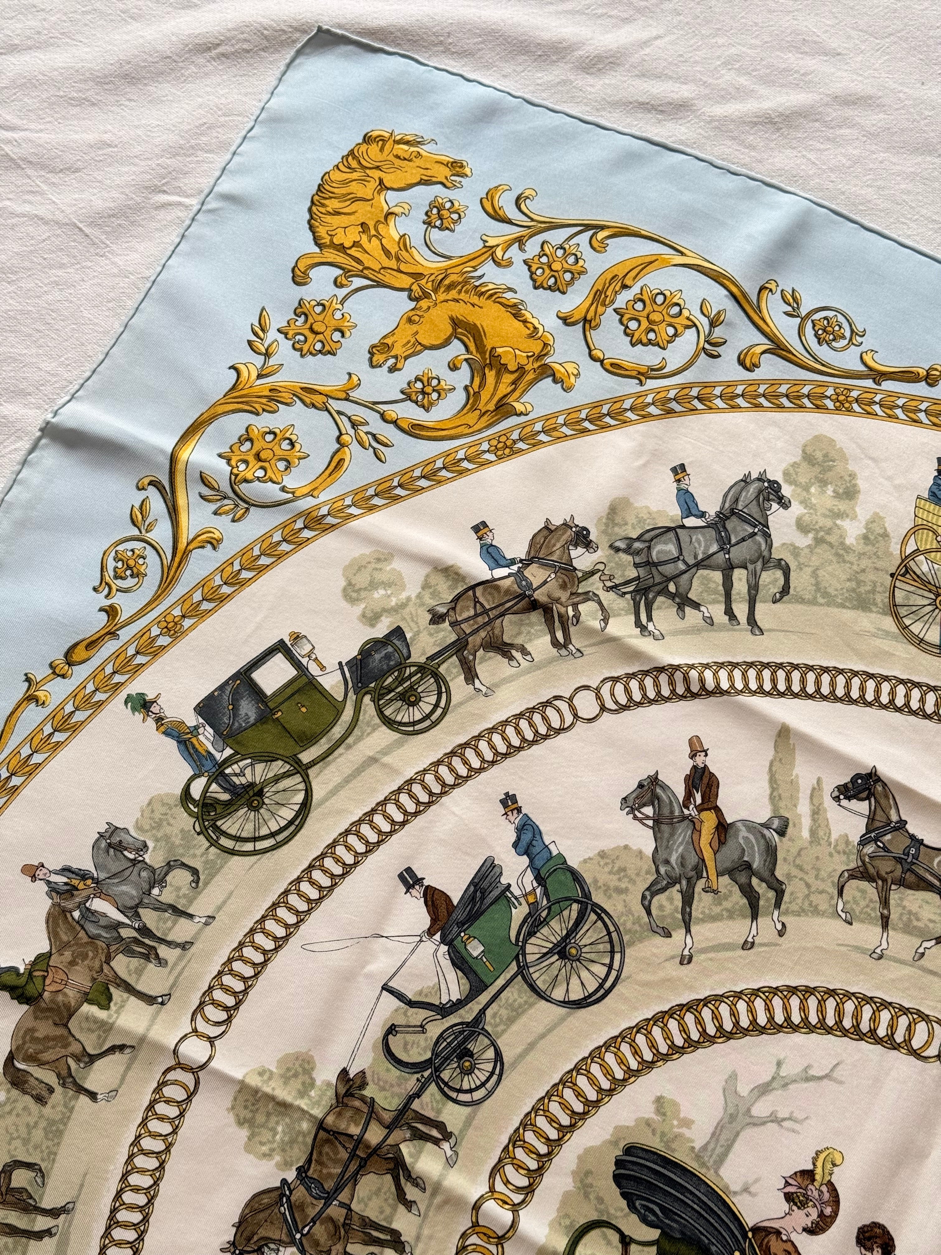 Foulard Hermès – Modèle La Promenade de Longchamps bleu ciel