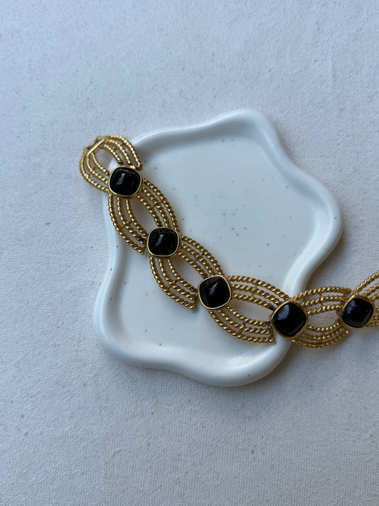 Bracelet Trifari vintage - Doré et cabochons noirs