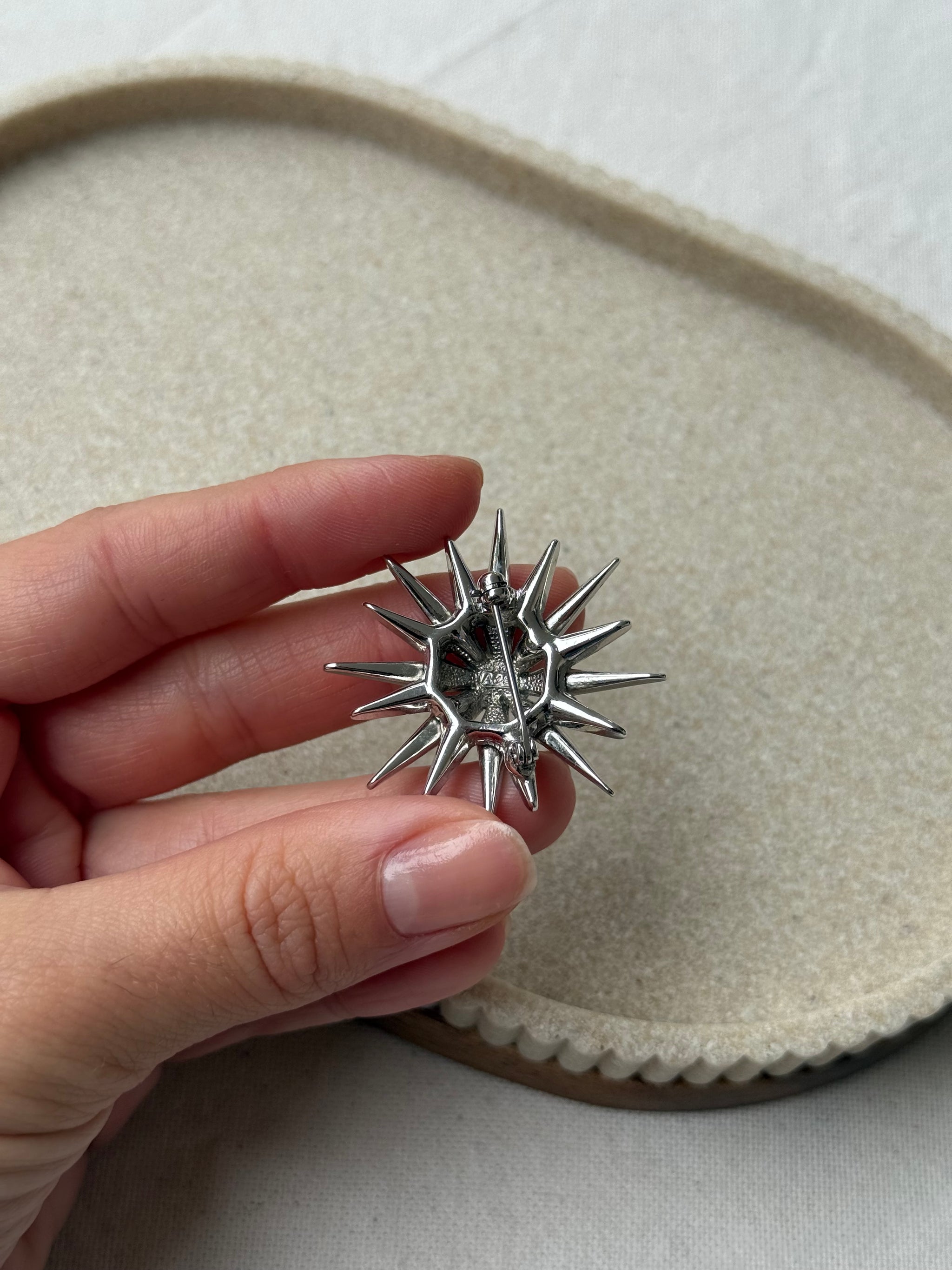 Broche Attwood & Sawyer vintage - Étoile scintillante argentée