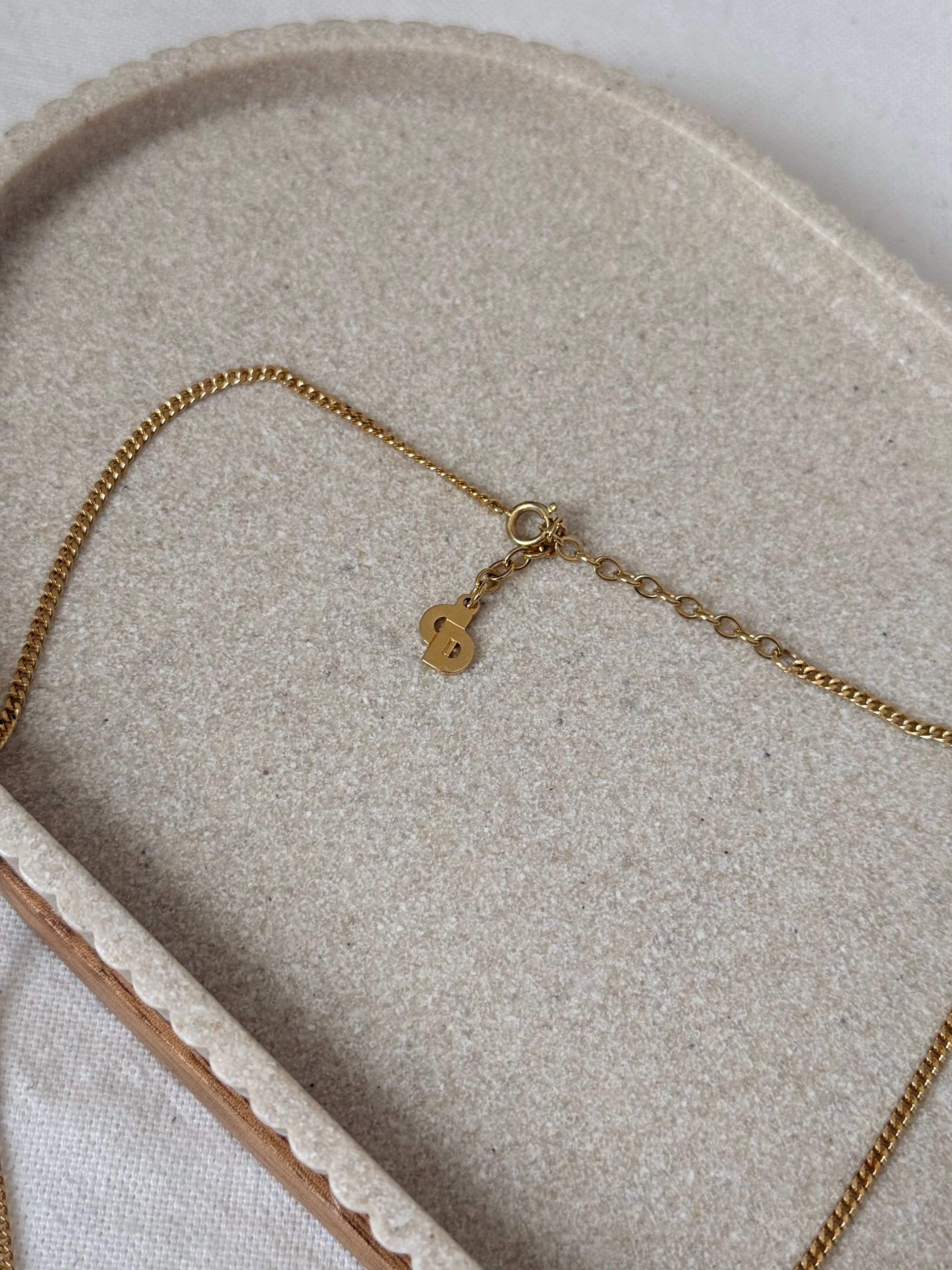 Collier Christian Dior vintage - Pendentif CD doré et strass