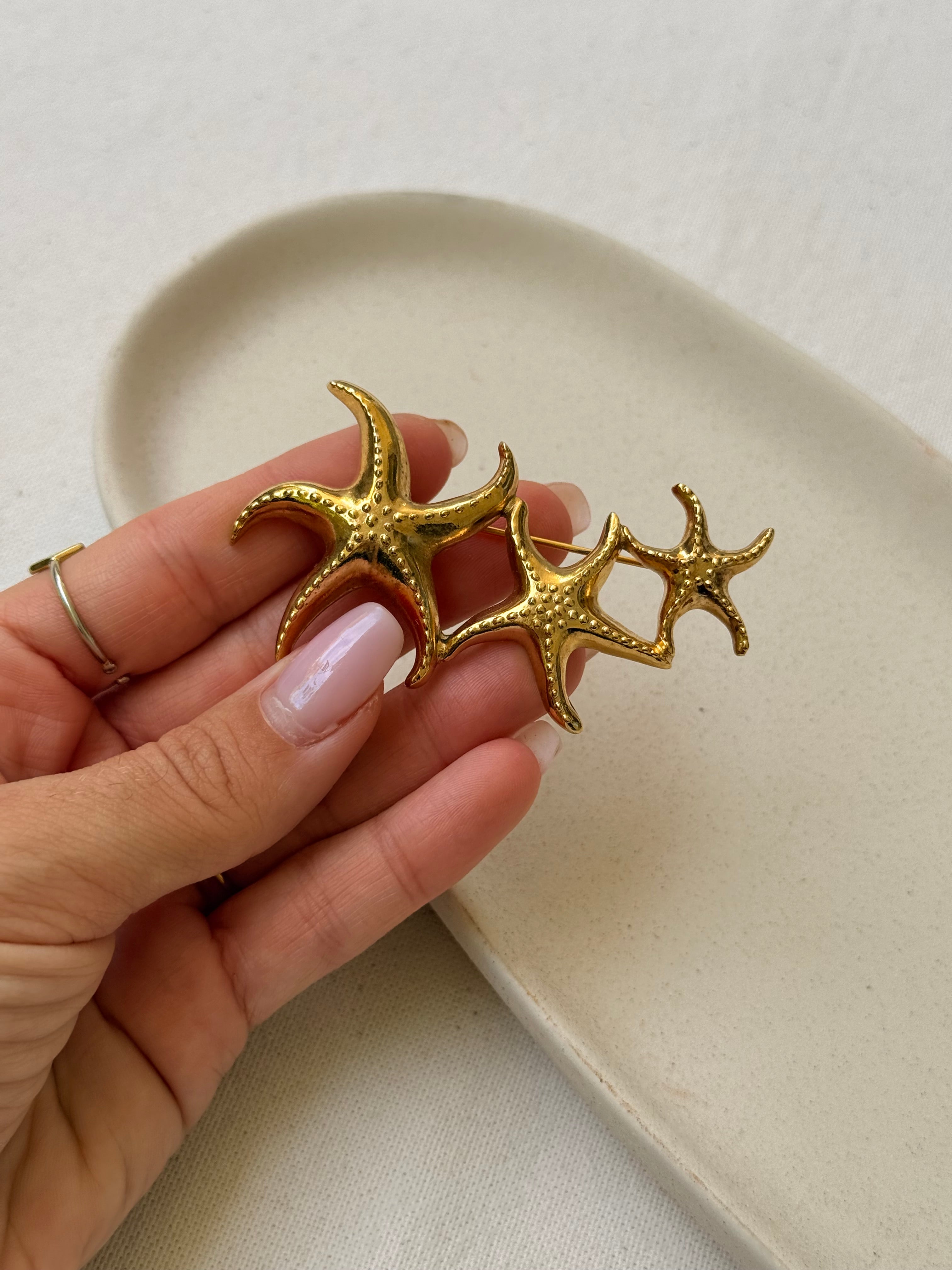 Broche vintage - Étoiles de mer dorée