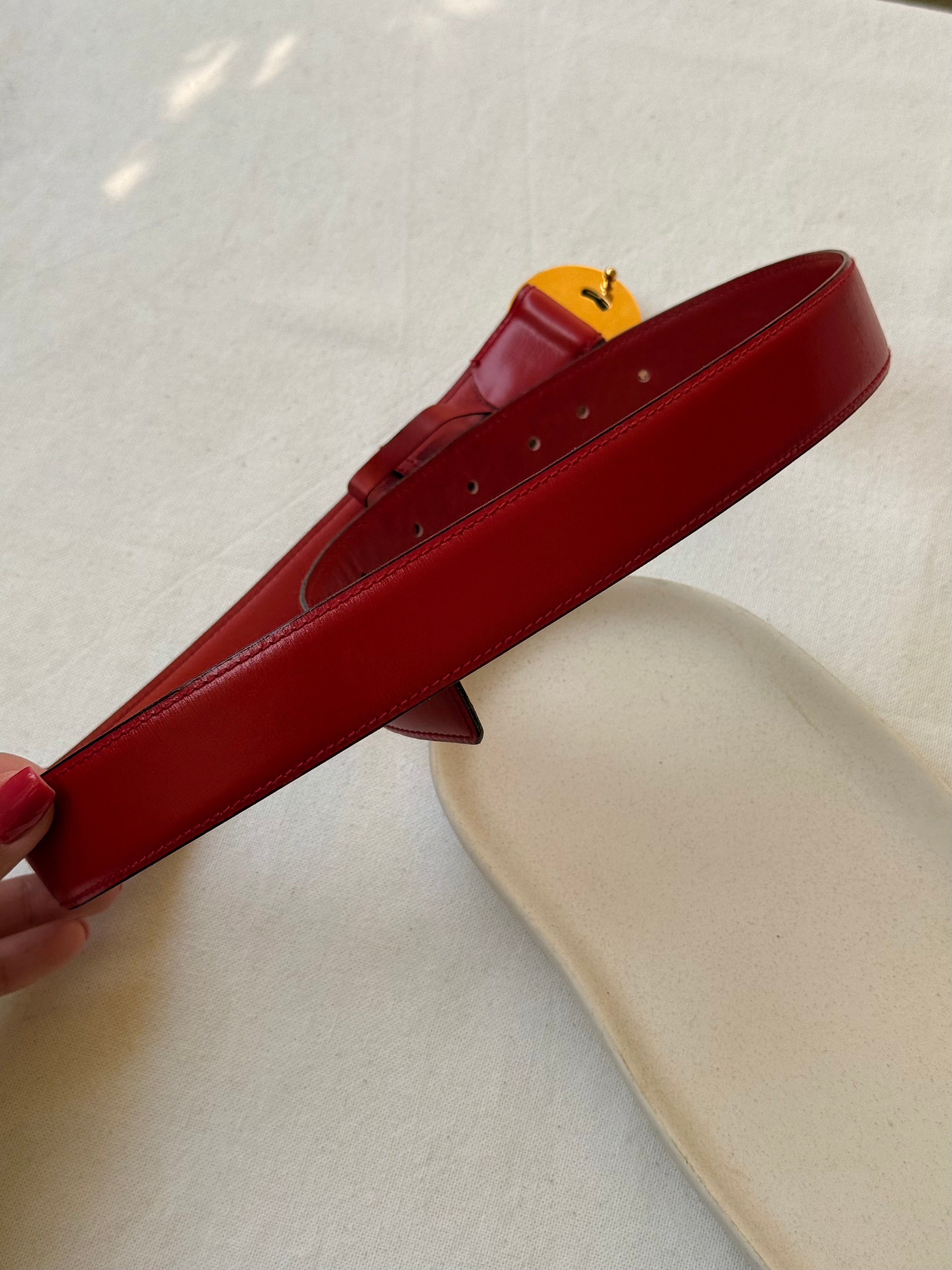 Ceinture Céline vintage - Boucle planète dorée et cuir rouge