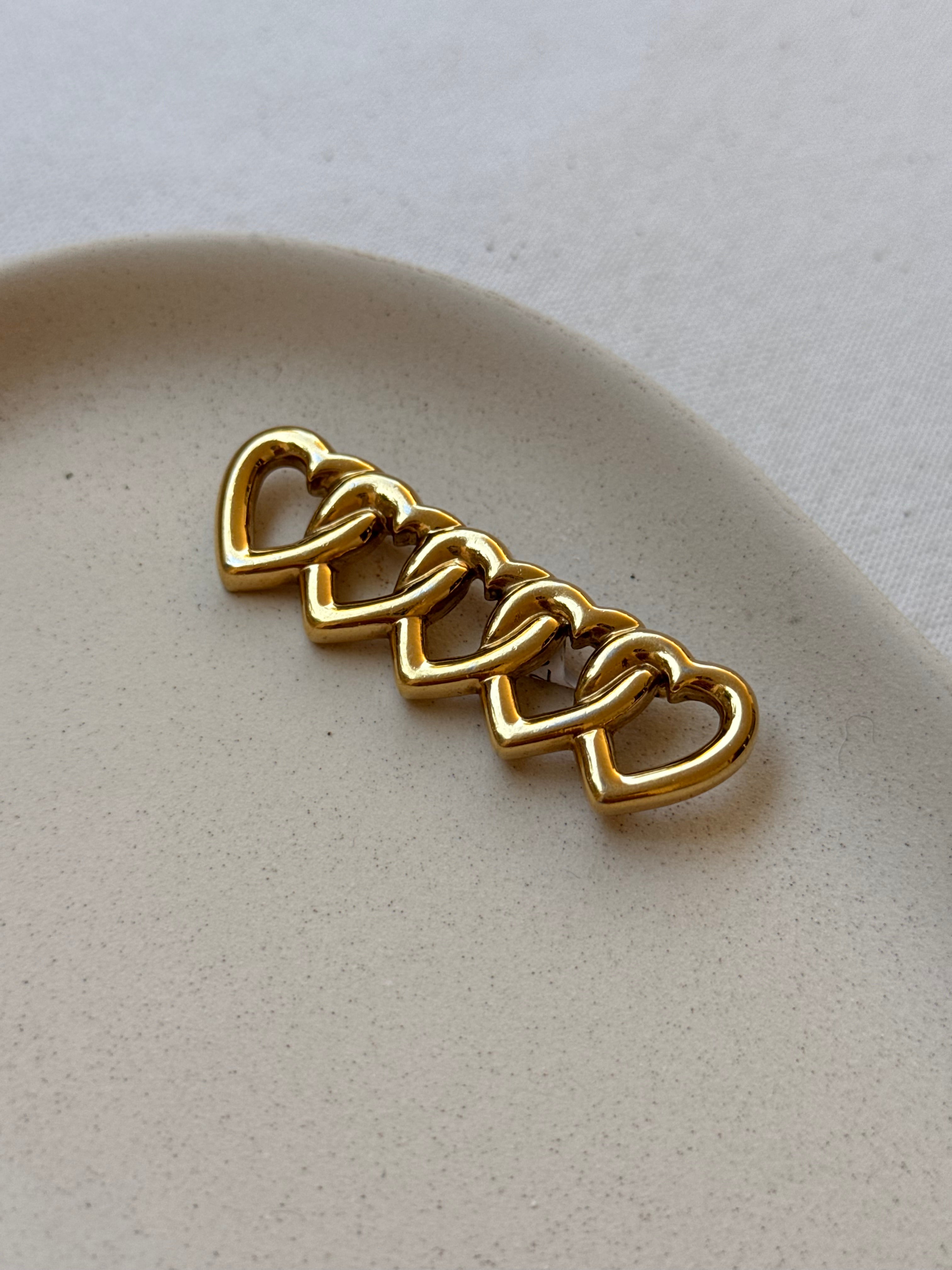 Broche Agatha vintage - Cœurs entrelacés dorés