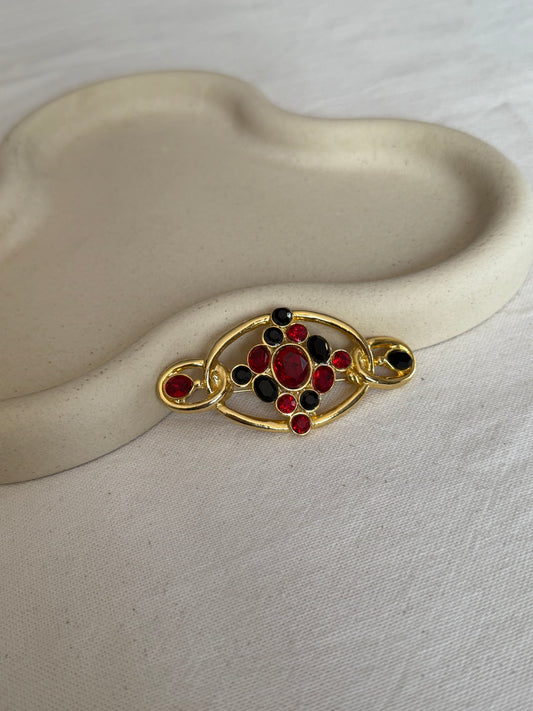 Broche vintage - Cristaux noirs et rouges