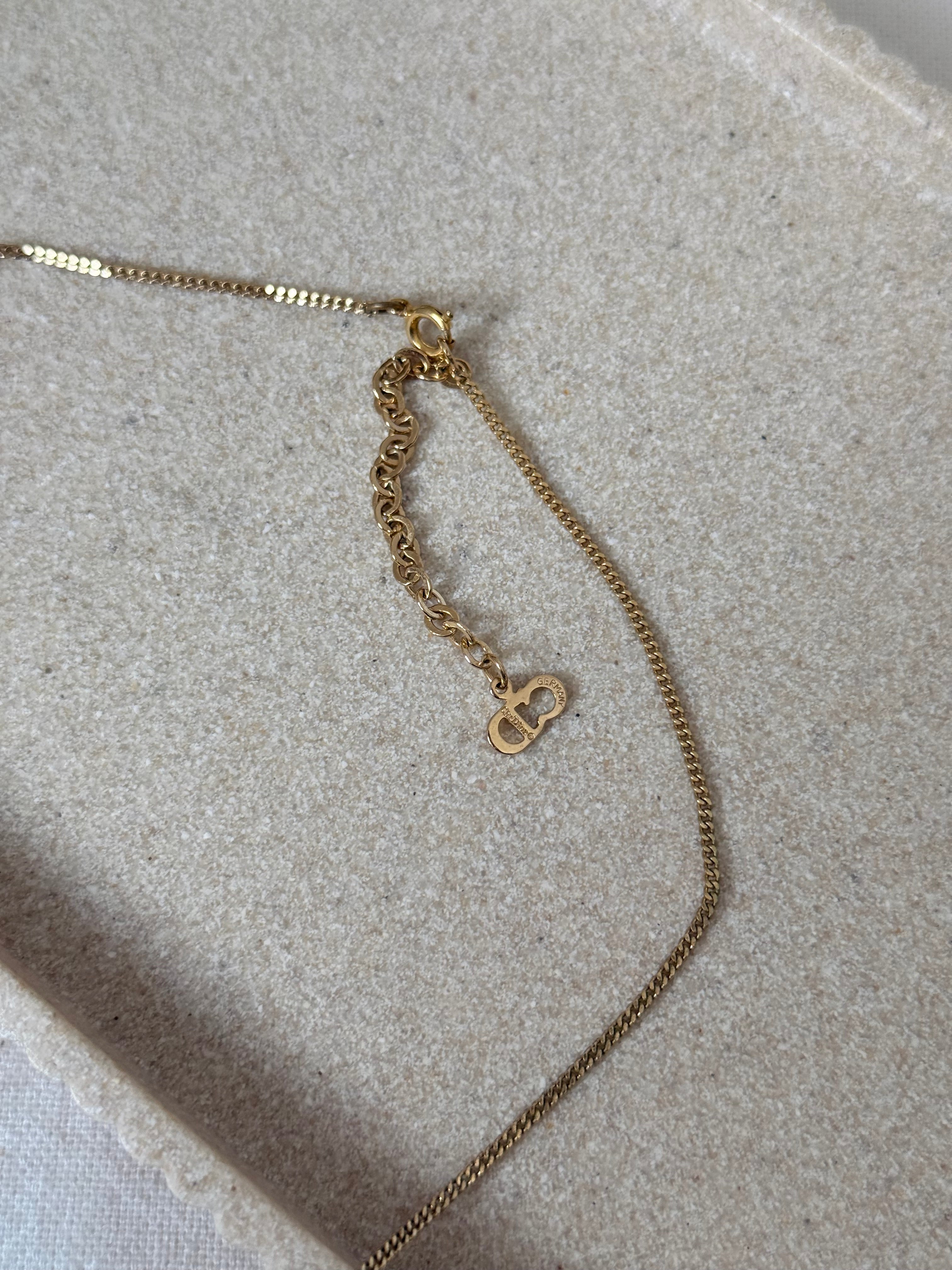 Collier Christian Dior vintage - Pendentif CD entrelacé et strass