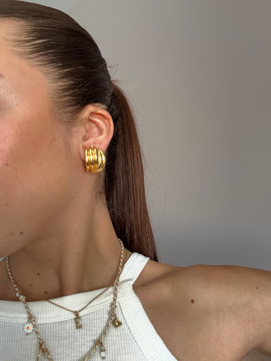 Boucles d’oreilles vintage demi-créoles dorées