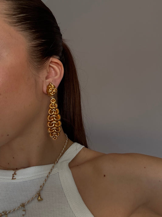 Boucles d’oreilles vintage pendantes arabesques dorées