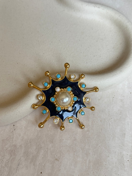 Broche soleil bleu vintage