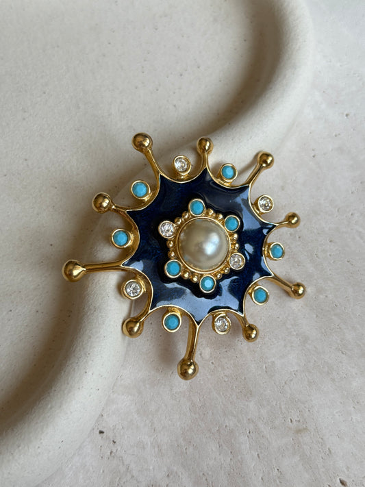 Broche soleil bleu vintage
