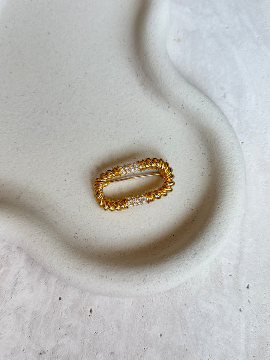 Broche ovale et strass vintage