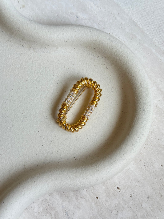 Broche ovale et strass vintage