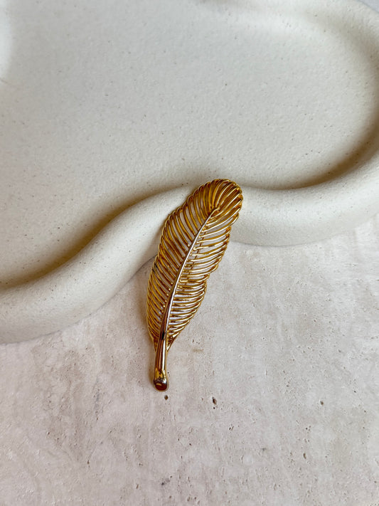 Broche plume dorée vintage